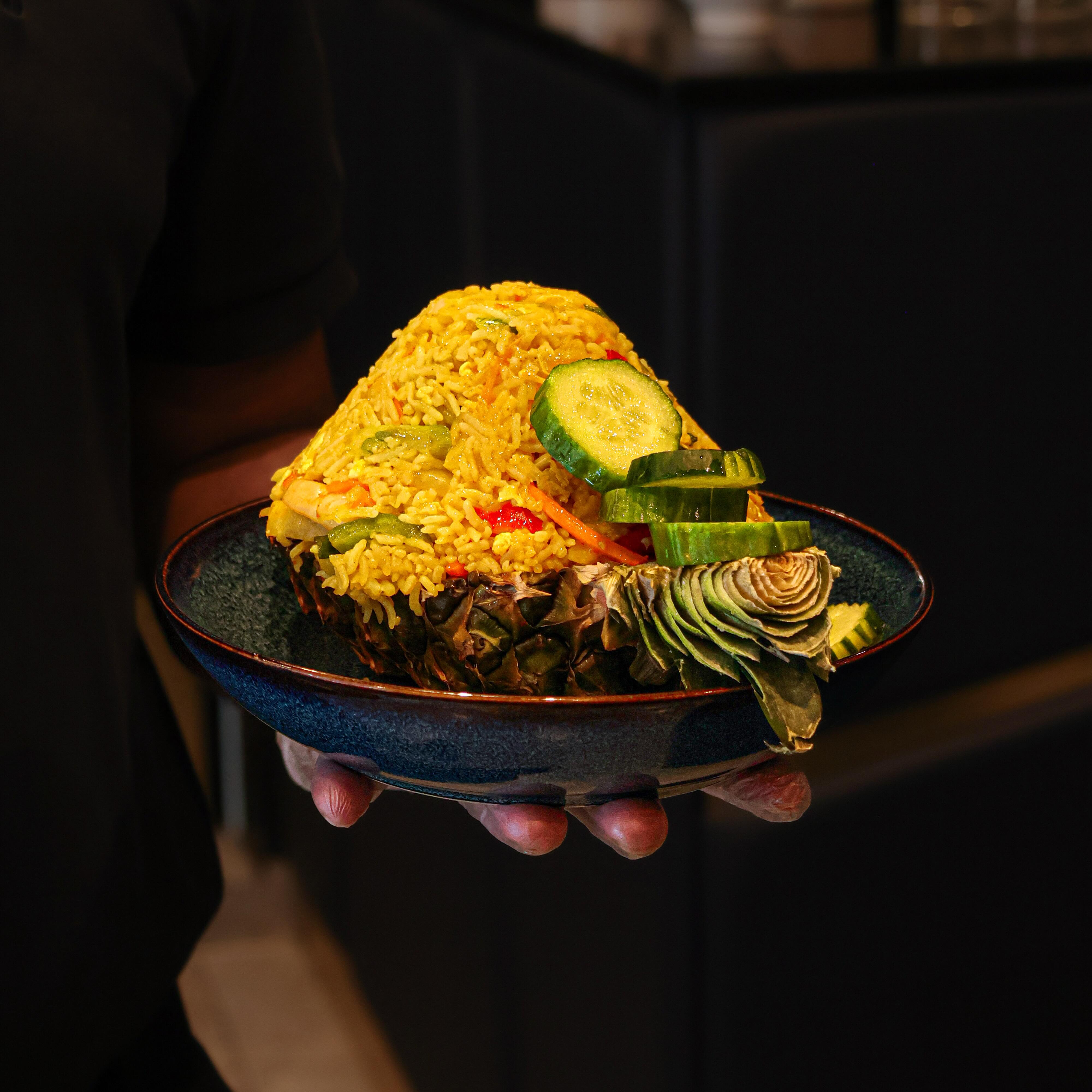 Pineapple fried rice, served in the pineapple.