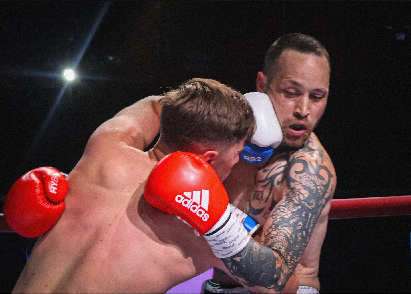 The shot that lands — captured ringside.